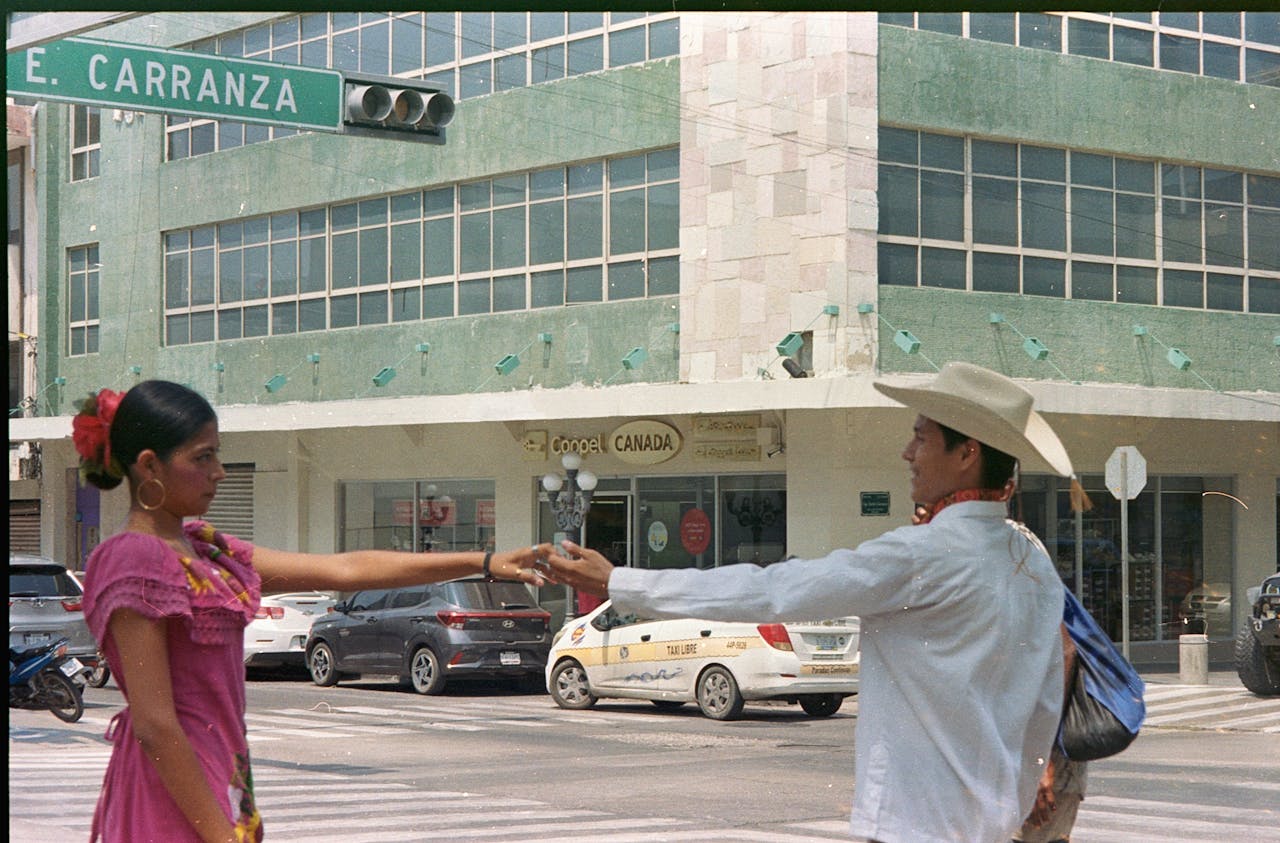 Home Colorful cultural dance captured on the streets of Tampico, Mexico, showcasing traditional attire.